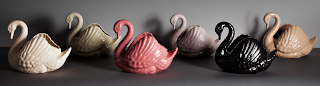 coloured ceramic swans