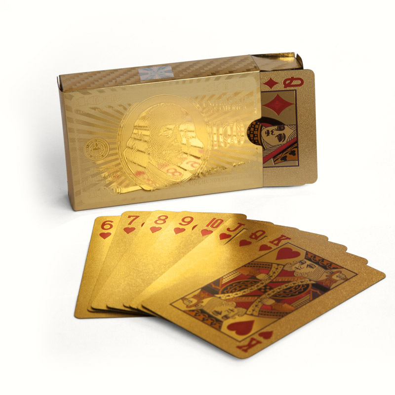 gold playing cards and box